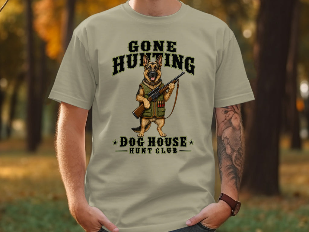 T-shirt with German Shepherd holding rifle, text "Gone Hunting Dog House Hunt Club".