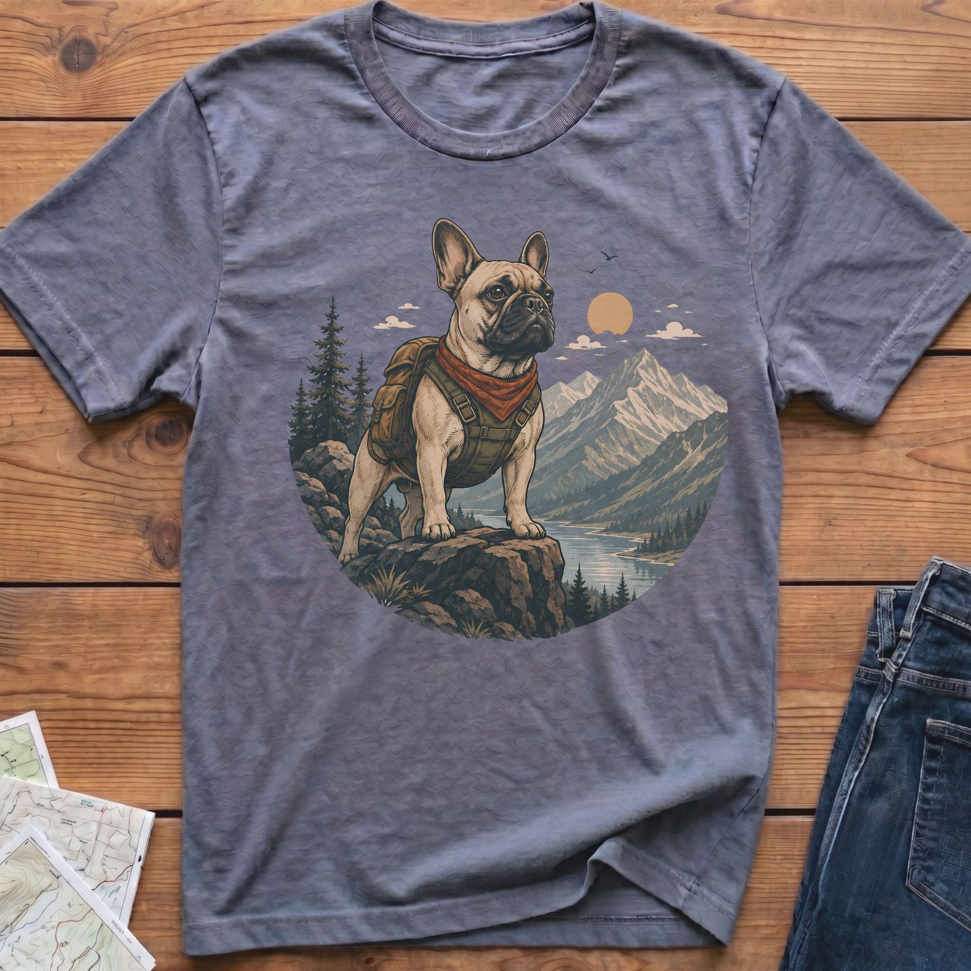 T-shirt with a French bulldog graphic wearing a backpack and bandana on a mountain landscape.