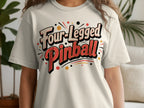 Cream t-shirt with retro text design reading "Four-Legged Pinball".