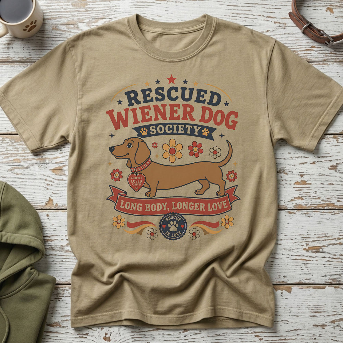 Tan t-shirt with "Rescued Wiener Dog Society Long Body, Longer Love" text and a dachshund.