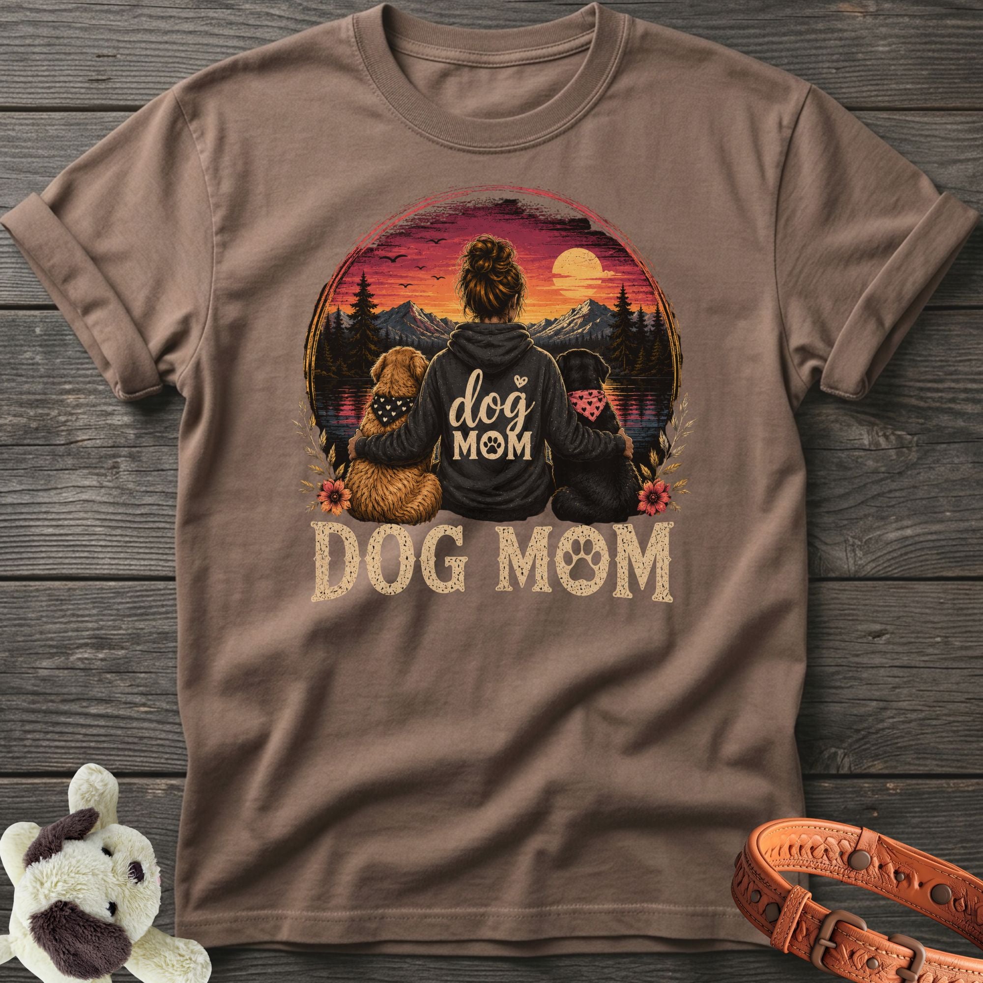 Brown t-shirt with "dog MOM" graphic featuring a woman and two dogs at sunset.