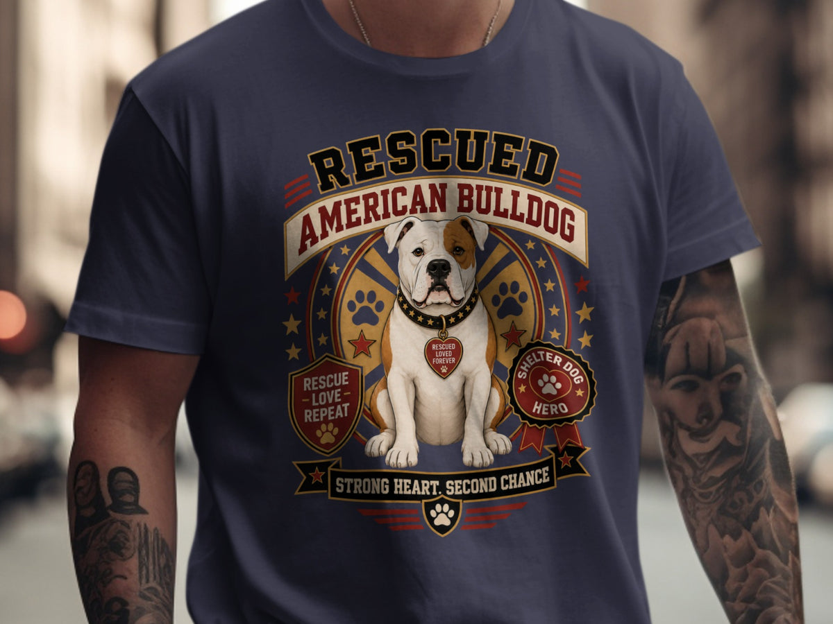 T-shirt graphic: Rescued American Bulldog with text "Rescue-Love-Repeat" and "Strong Heart. Second Chance."