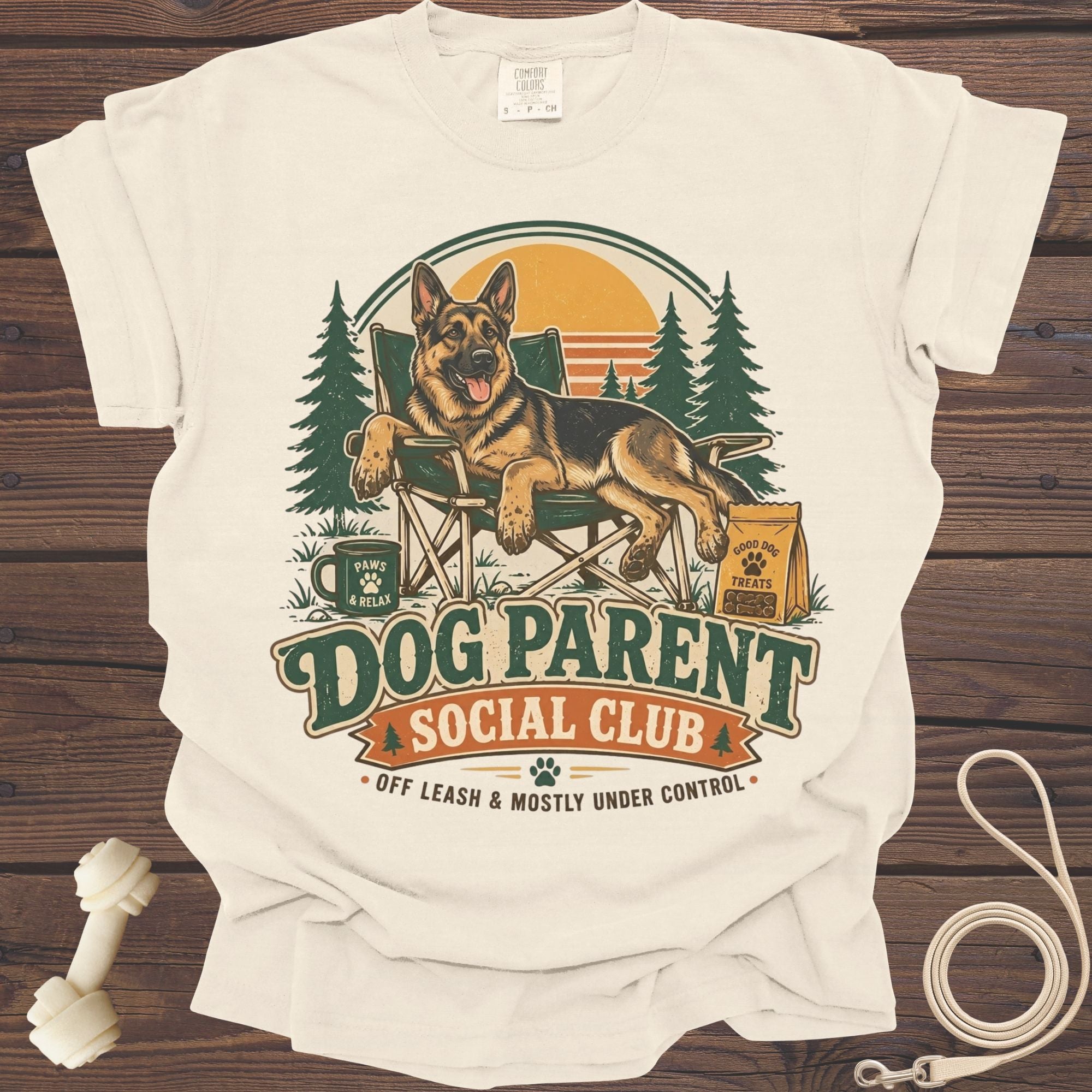 German Shepherd relaxing in a chair with "Dog Parent Social Club" text.