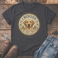 Labrador dog graphic with text "I RESCUED MY BEST FRIEND" on a t-shirt.